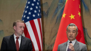 US, China trade warnings during tense visit