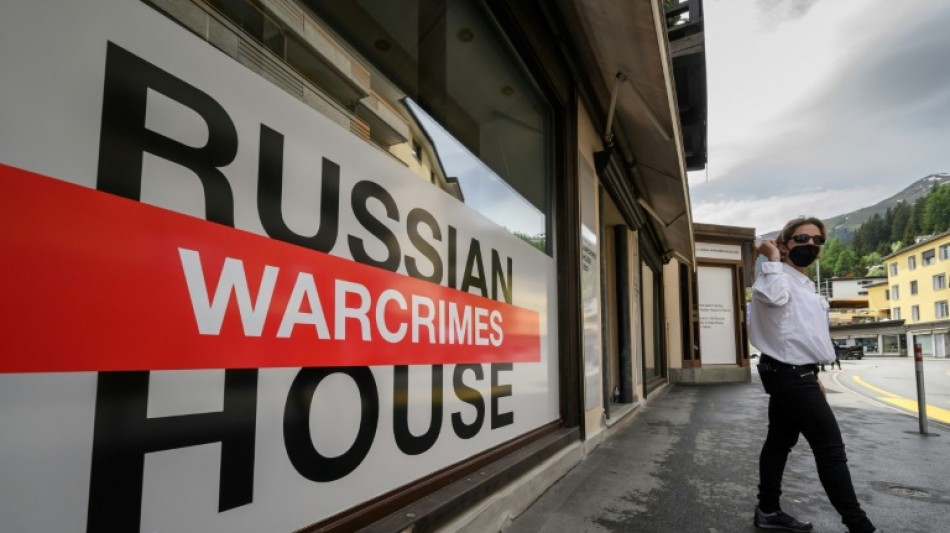 In Davos, Ukrainians host "Russian War Crimes House"