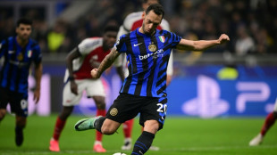 Inter Milan sink Arsenal in Champions League, Atletico sting PSG late on