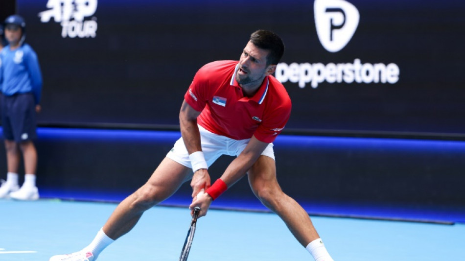 Injury worries for Djokovic, Tsitsipas as Serbia squeeze into quarters