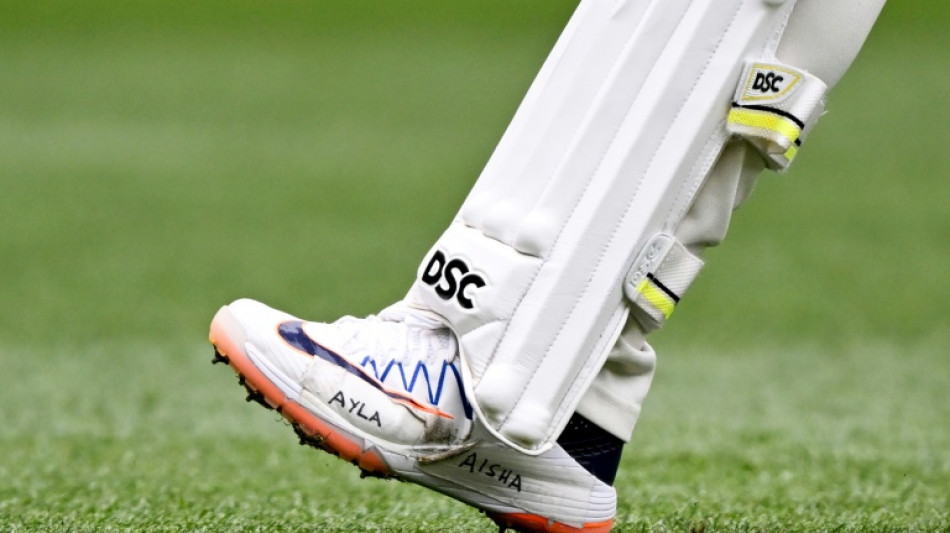 Khawaja sports shoes with daughters' names in Pakistan Test