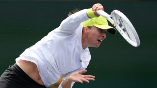 Swiatek surges into quarter-finals at rainy Indian Wells, Rune tops Tsitsipas