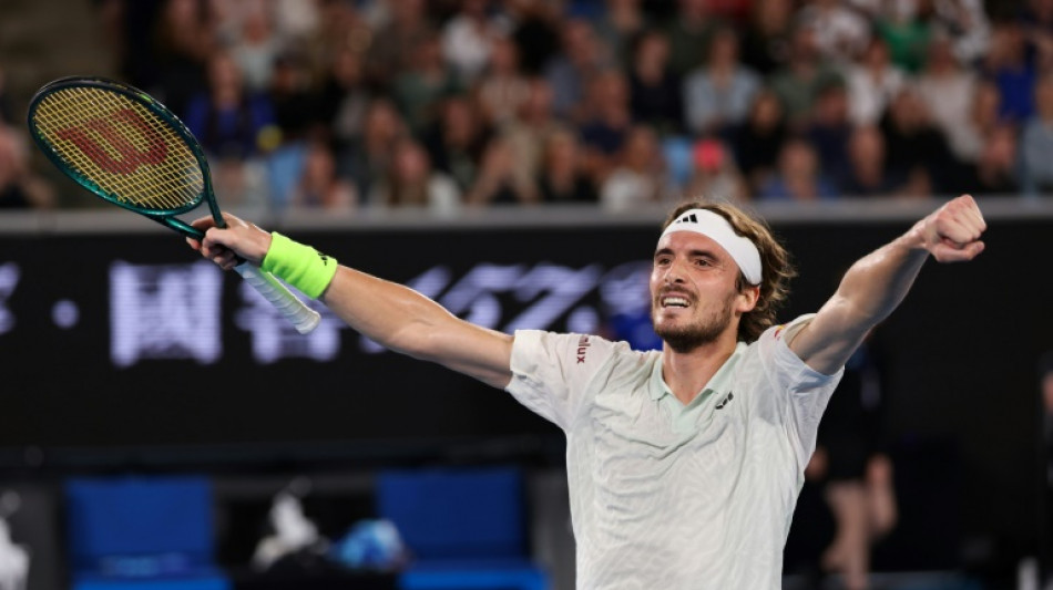 Tsitsipas comes through 'insane' battle at Australian Open