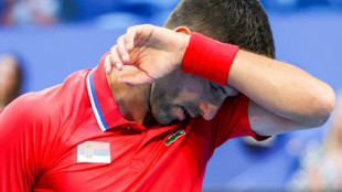 Djokovic wrist injury dooms Serbia to Australia defeat