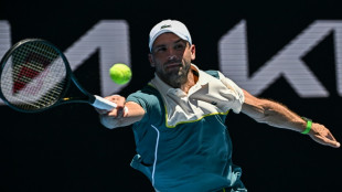 Dimitrov cuts out errors to progress at Australian Open