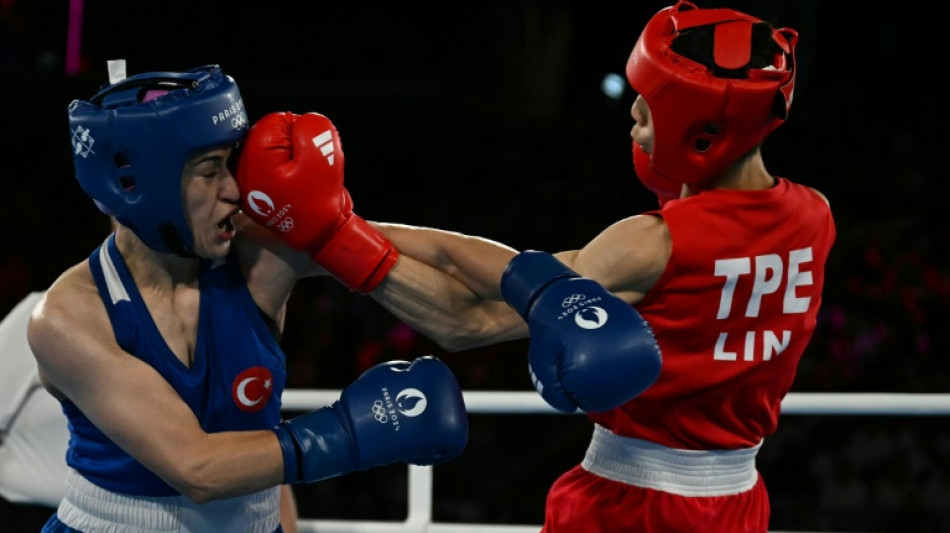 Taiwan boxer in Olympics gender row into final after 'tough journey'