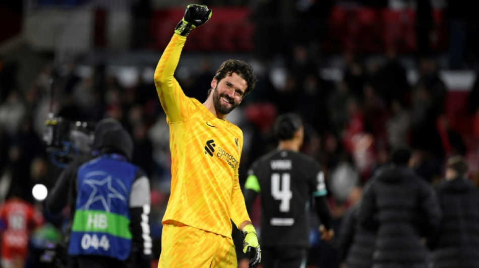 Alisson tells title-chasing Liverpool to create own history