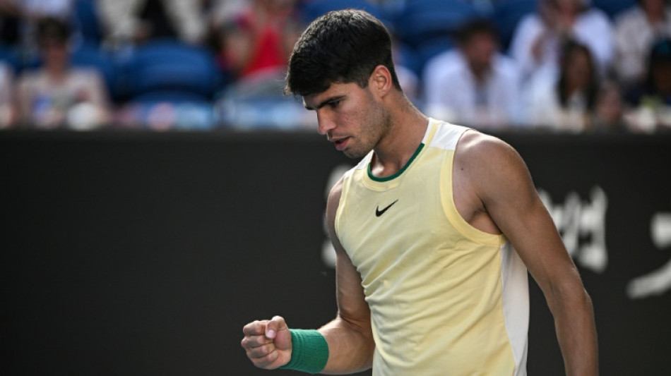 Alcaraz made to work for Australian Open third-round berth