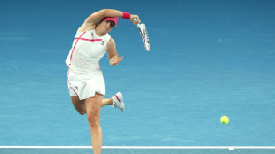 Swiatek survives epic to make Australian Open third round