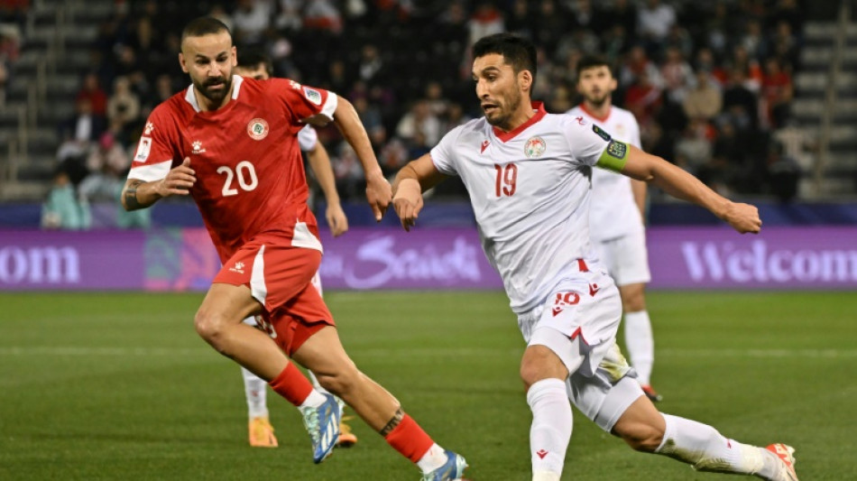 Debutants Tajikistan fight back to reach Asian Cup knockouts 