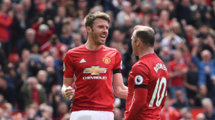 Carrick wants to see Rooney back in dugout after sacking