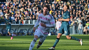 Vlahovic fires Juve one point behind leaders Inter