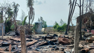 Battered, empty Myanmar town shows price of victory against junta