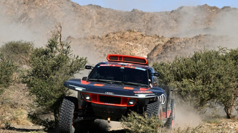 Loeb keeps tabs with Dakar leader Sainz