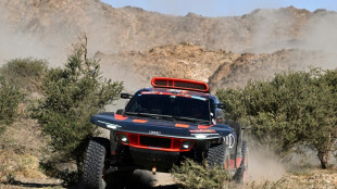 Loeb keeps tabs with Dakar leader Sainz