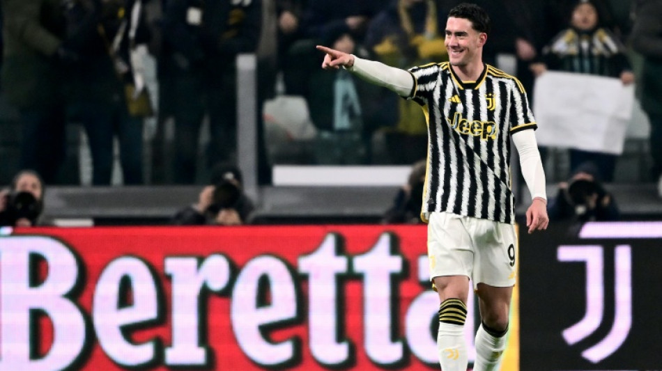 Vlahovic brace pushes Juve two points behind leaders Inter