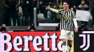 Vlahovic brace pushes Juve two points behind leaders Inter