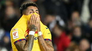 Barca 'give away' points at Valencia, Atletico stumble