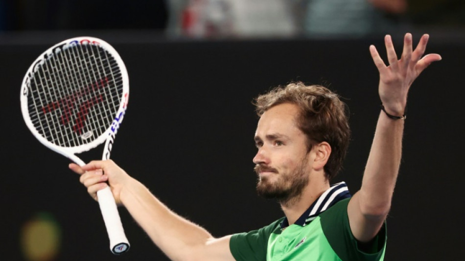 Medvedev battles back from two sets down to make Australian Open final 