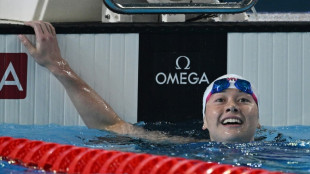 Hong Kong's Haughey wins first world swim gold