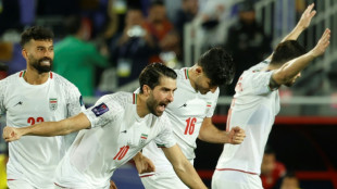 Iran survive penalty drama to book Asian Cup clash with Japan