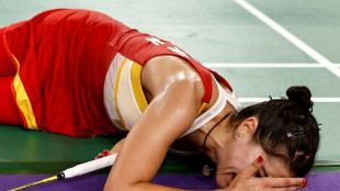 Distraught Marin retires from Olympic badminton semi with knee injury