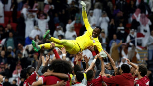 Goalkeeper saves Qatar in shootout to set up Iran semi at Asian Cup