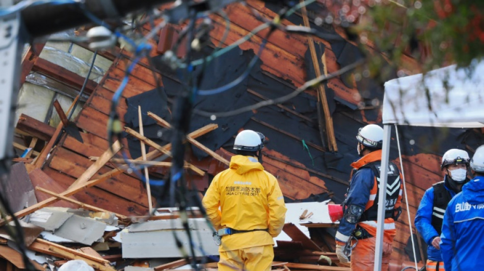 Elderly woman pulled from rubble five days after Japan quake