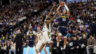 Reigning NBA champion Nuggets cool down red-hot Pacers