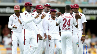 Australia strike late to claim slight advantage over West Indies