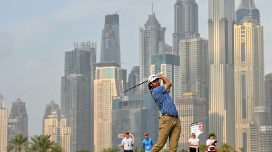 Young leads by three as McIlroy trails at Dubai Desert Classic