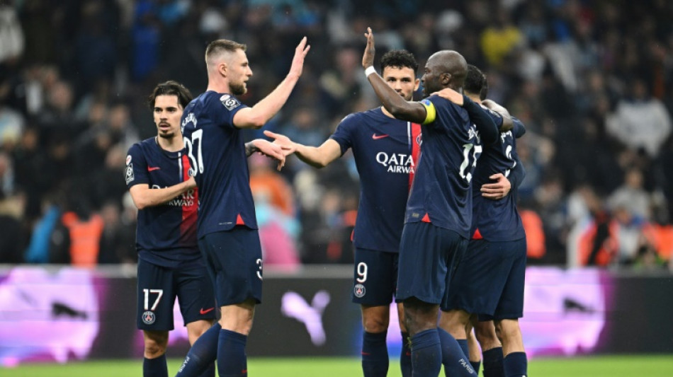 PSG overcome red card to beat Marseille and take step closer to title