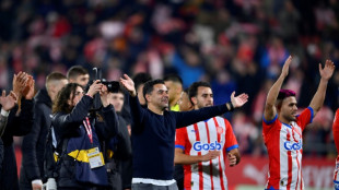 Girona edge Atletico thriller, stay level with Real Madrid