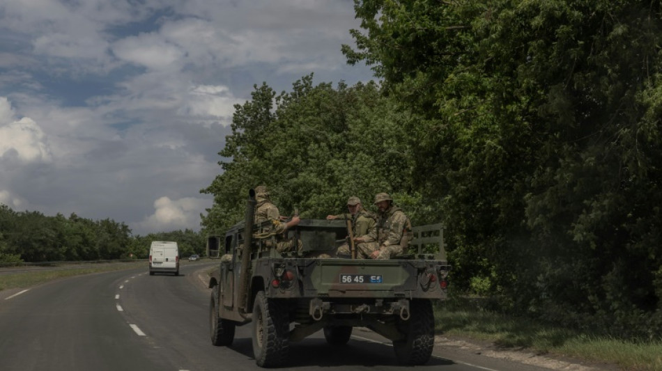 Ukraine claims drone attack on oil tanks in Russia