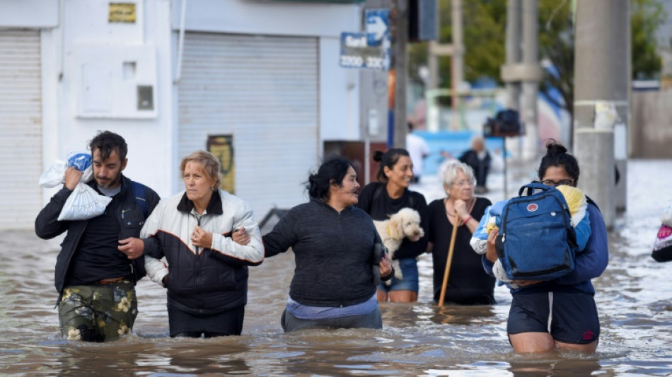 Argentina searches for baby, sister swept away by floods