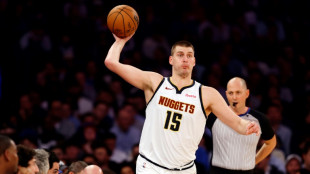 Jokic and Nuggets hold off Embiid-less 76ers