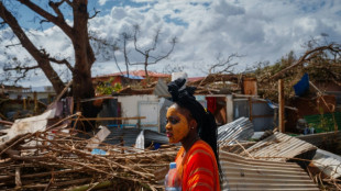 Macron hears accounts of despair in Mayotte after cyclone disaster