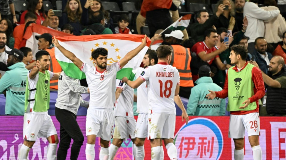 Tajikistan reach Asian Cup knockouts, China on brink of exit