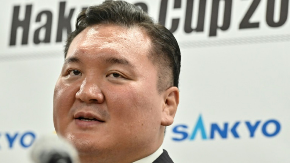 Sumo great Hakuho demoted over protege's bullying