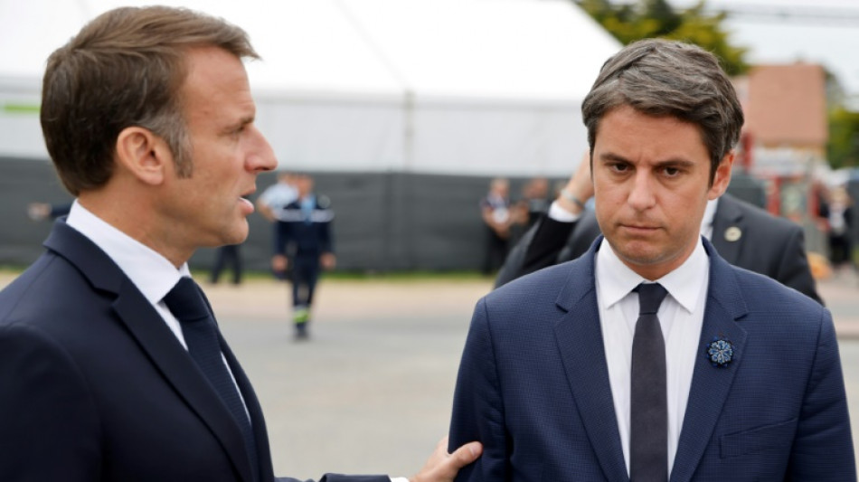 French PM: surprised campaign leader in Macron's 'sudden' poll gambit