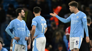 Olise's late penalty rocks Man City as Palace hold champions