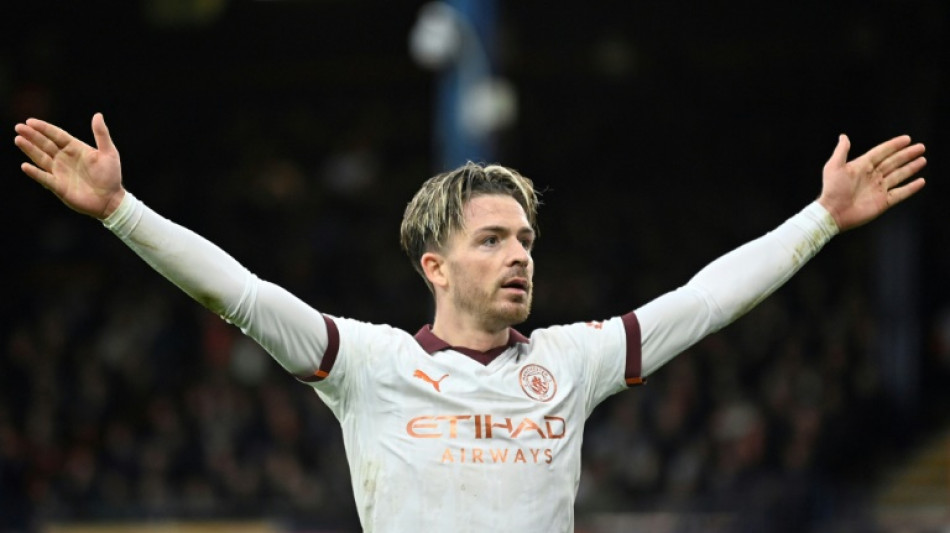 Grealish puts Man City back on track after Luton scare