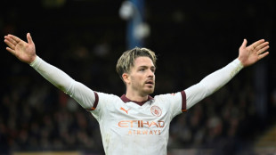 Grealish puts Man City back on track after Luton scare