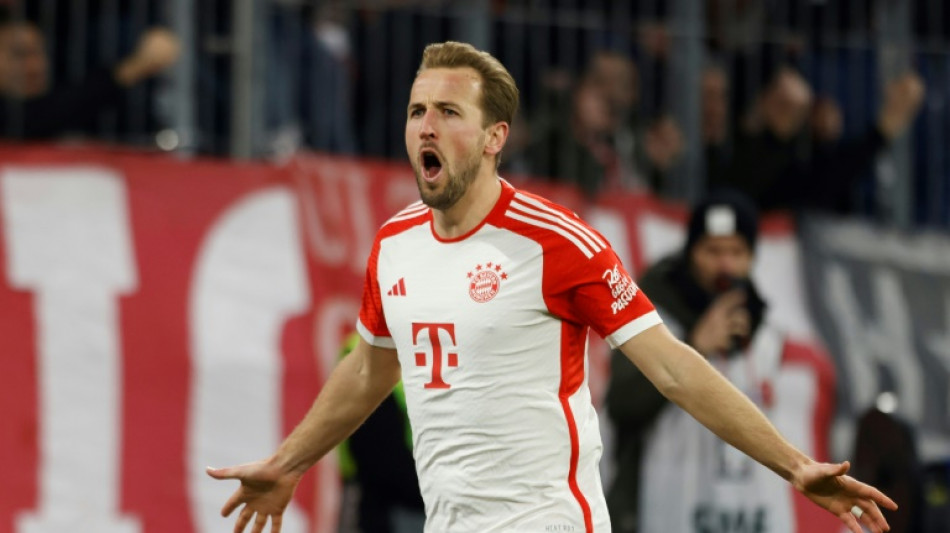 Kane brace helps Bayern keep pace with leaders Leverkusen