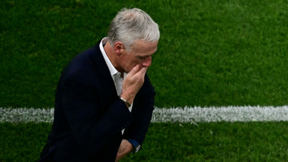 France coach Deschamps holds hands up after Euro 2024 exit