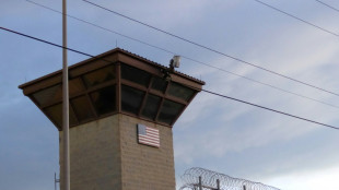 US flights carrying detained migrants to Guantanamo 'underway'