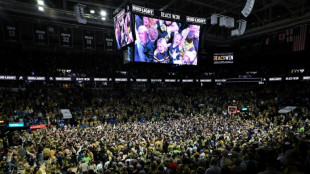 US college basketball 'court-storming' under fire after injury