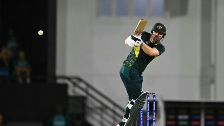 Australia sink brave Scots at T20 World Cup, England advance