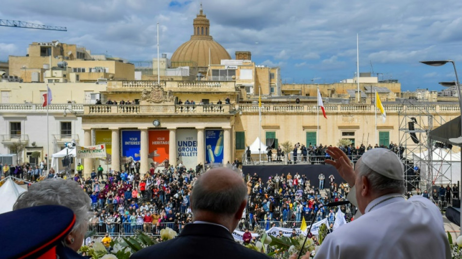 Pope tells 'safe harbour' Malta to resist isolation in migrant surge