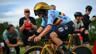 Olympic champion Evenepoel retains world title in 'toughest time trial'